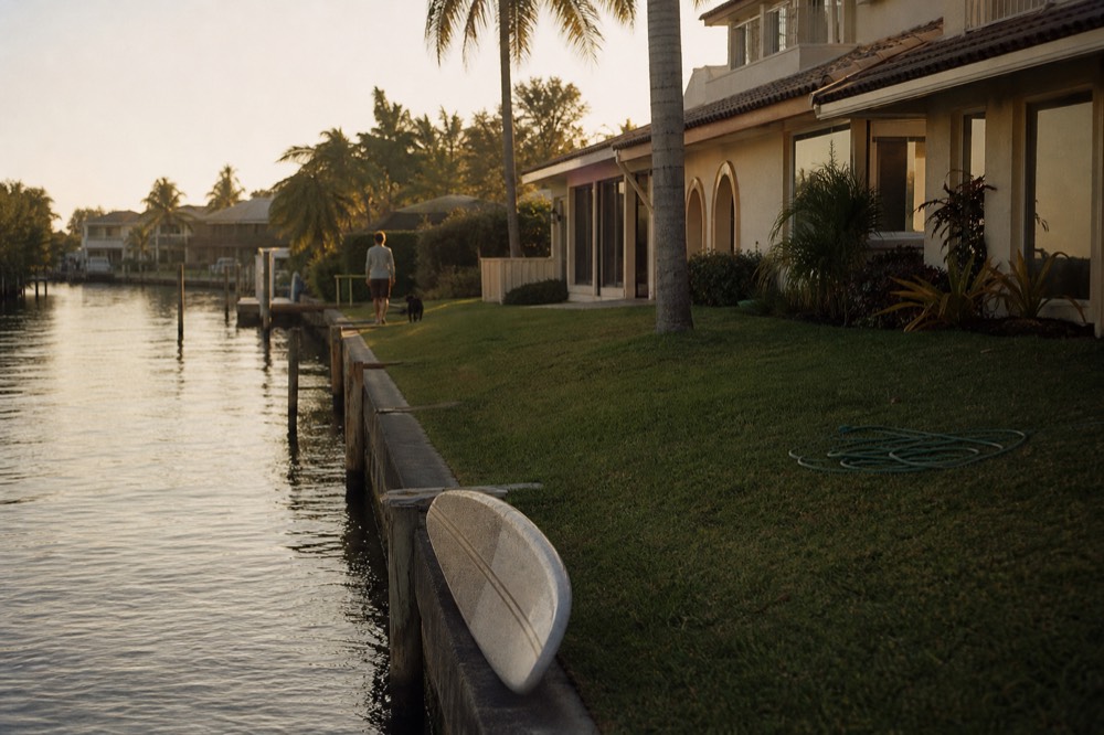 A quiet stretch of the Intracoastal Waterway at golden hour with waterfront homes, no text, no logos, no people