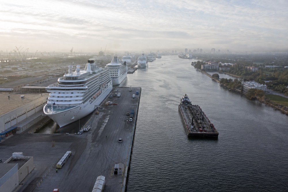 Aerial view of the Intracoastal Waterway and Port Everglades with cruise ships docked, no text, no logos, no people